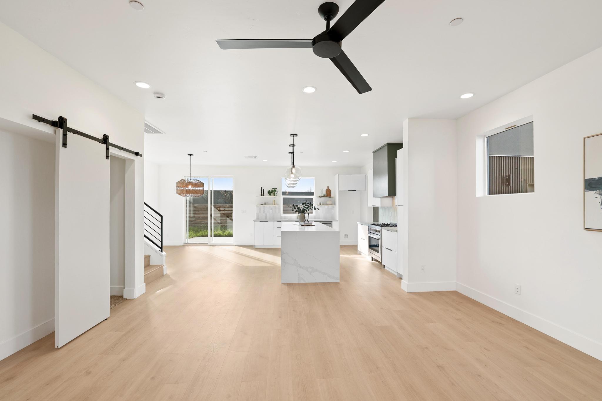 2450 Neighborly Way Redding, CA 96001 - Photo 3 of 48 a living room with furniture and a ceiling fan