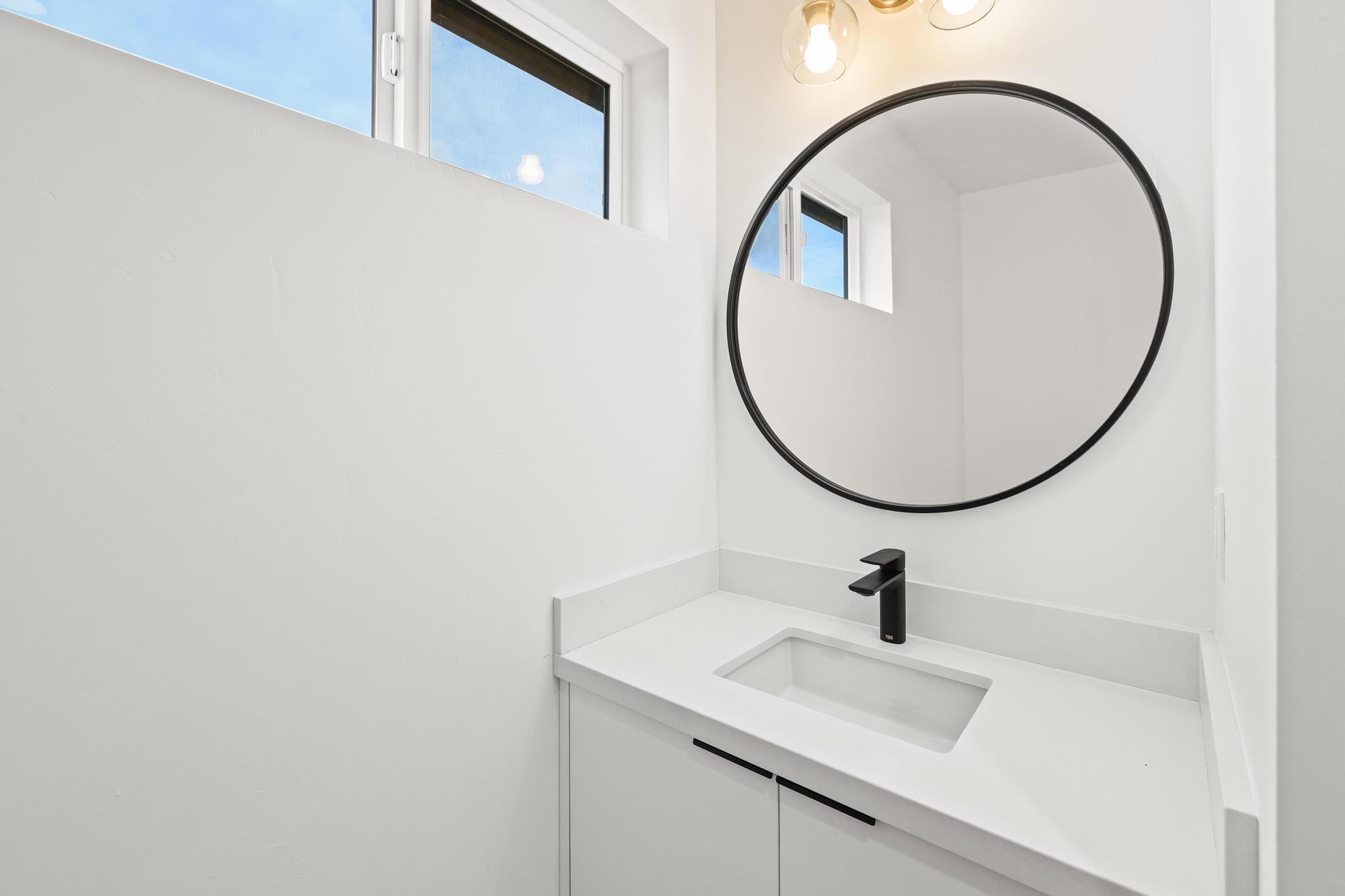 2450 Neighborly Way Redding, CA 96001 - Photo 31 of 48 a bathroom with a sink and a mirror