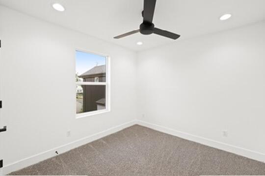 2450 Neighborly Way Redding, CA 96001 - Photo 38 of 48 an empty room with a window and ceiling fan