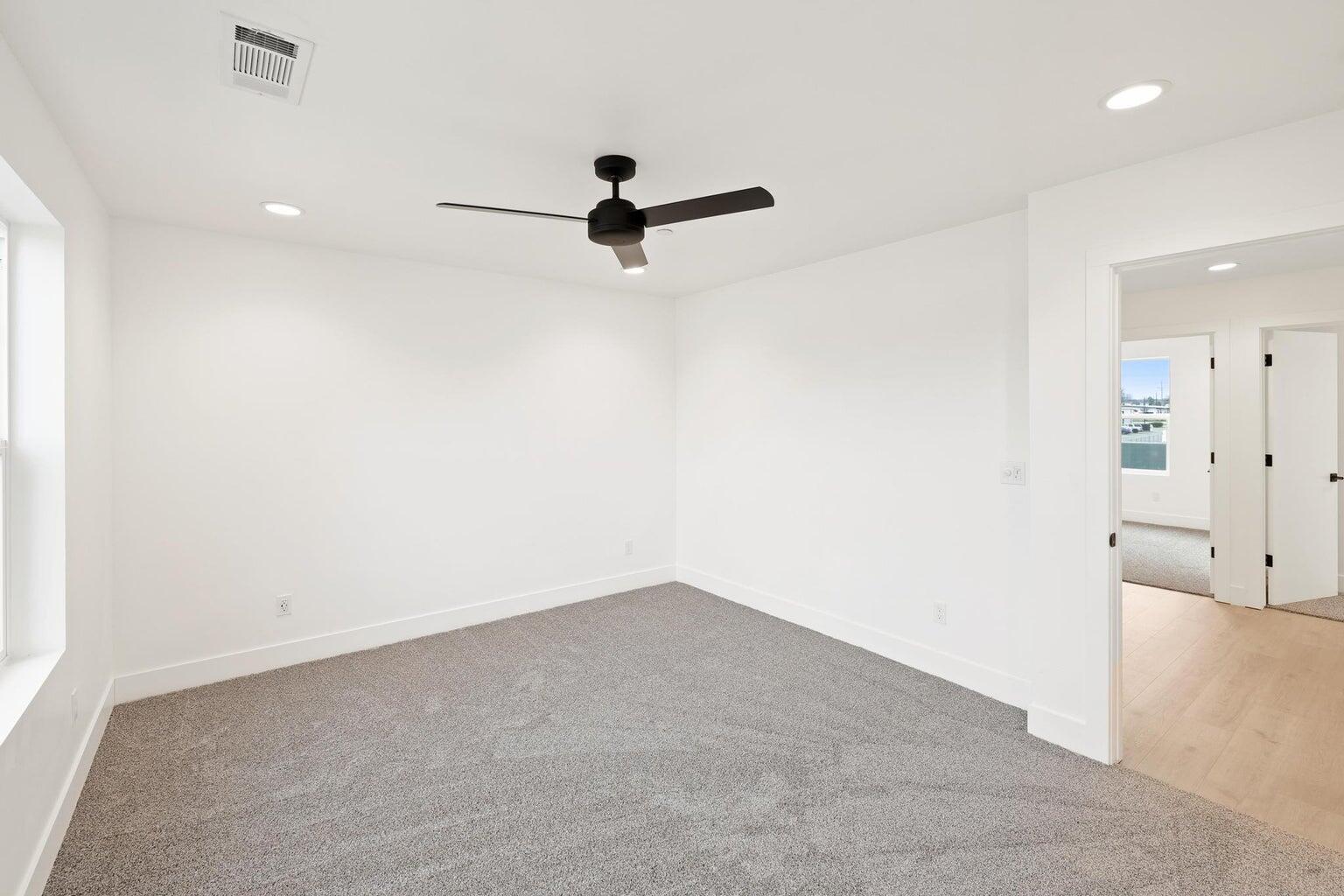 2450 Neighborly Way Redding, CA 96001 - Photo 41 of 48 an empty room with closet and windows