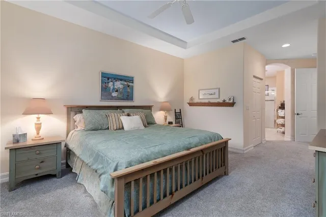 a bedroom with a bed and a cabinets