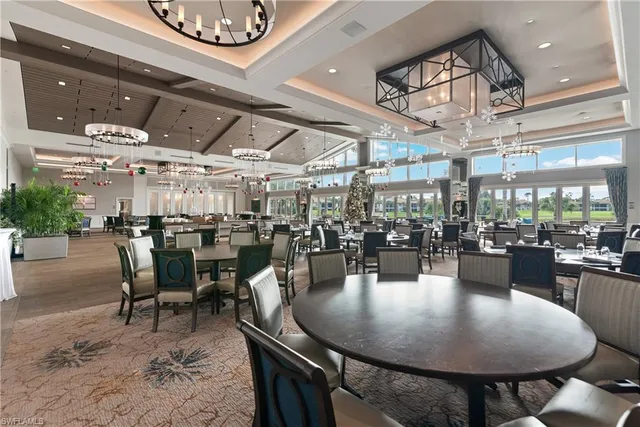 a dining room with lots of tables and chairs