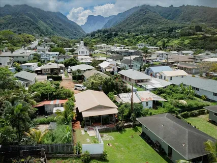 an aerial view of a house with a garden