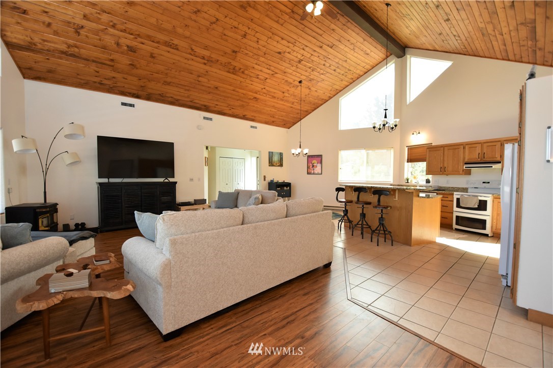 9 Hahn Road Omak, WA 98841 - Photo 14 of 34 a living room with furniture and a flat screen tv