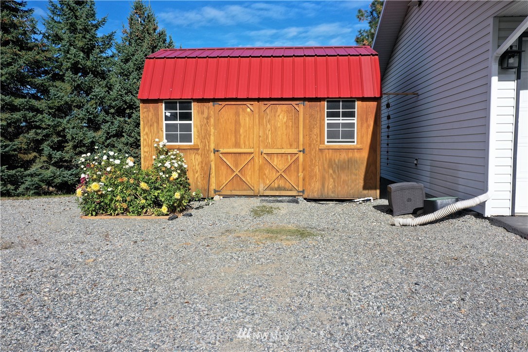 9 Hahn Road Omak, WA 98841 - Photo 6 of 34 a view of a house with a yard