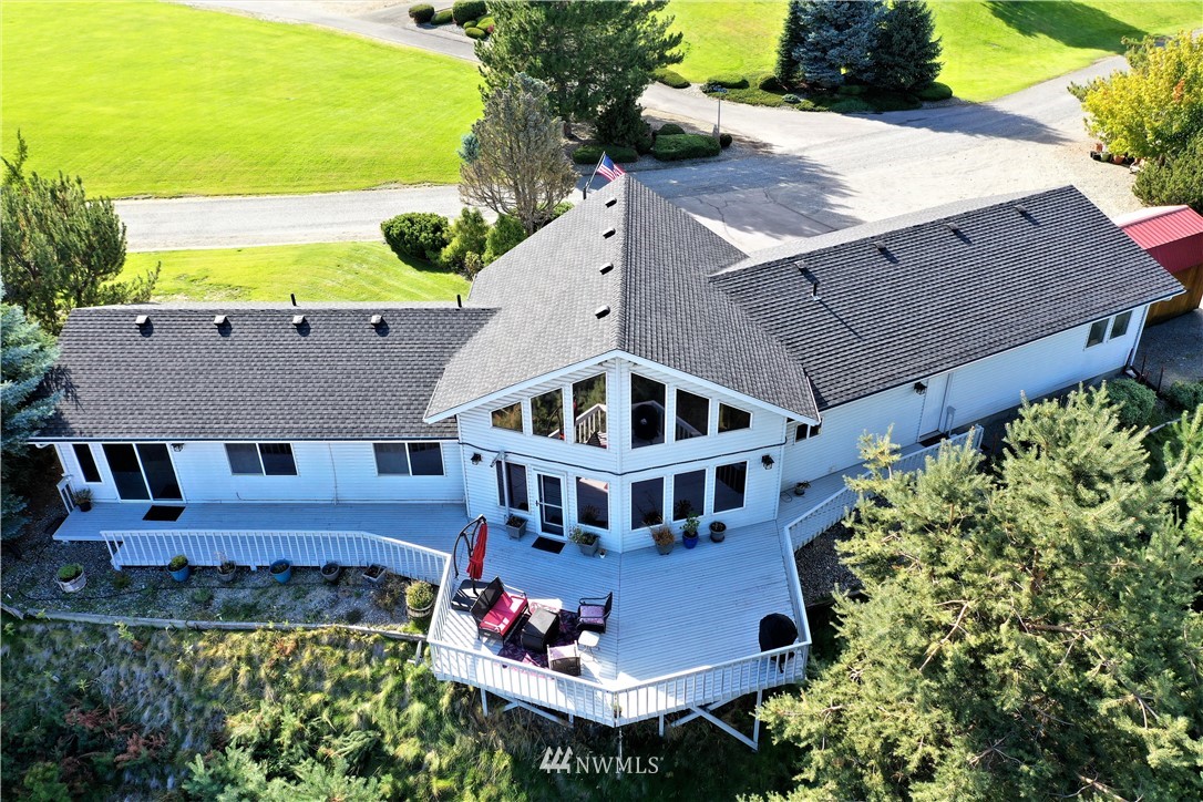 9 Hahn Road Omak, WA 98841 - Photo 9 of 34 an aerial view of a house with a garden