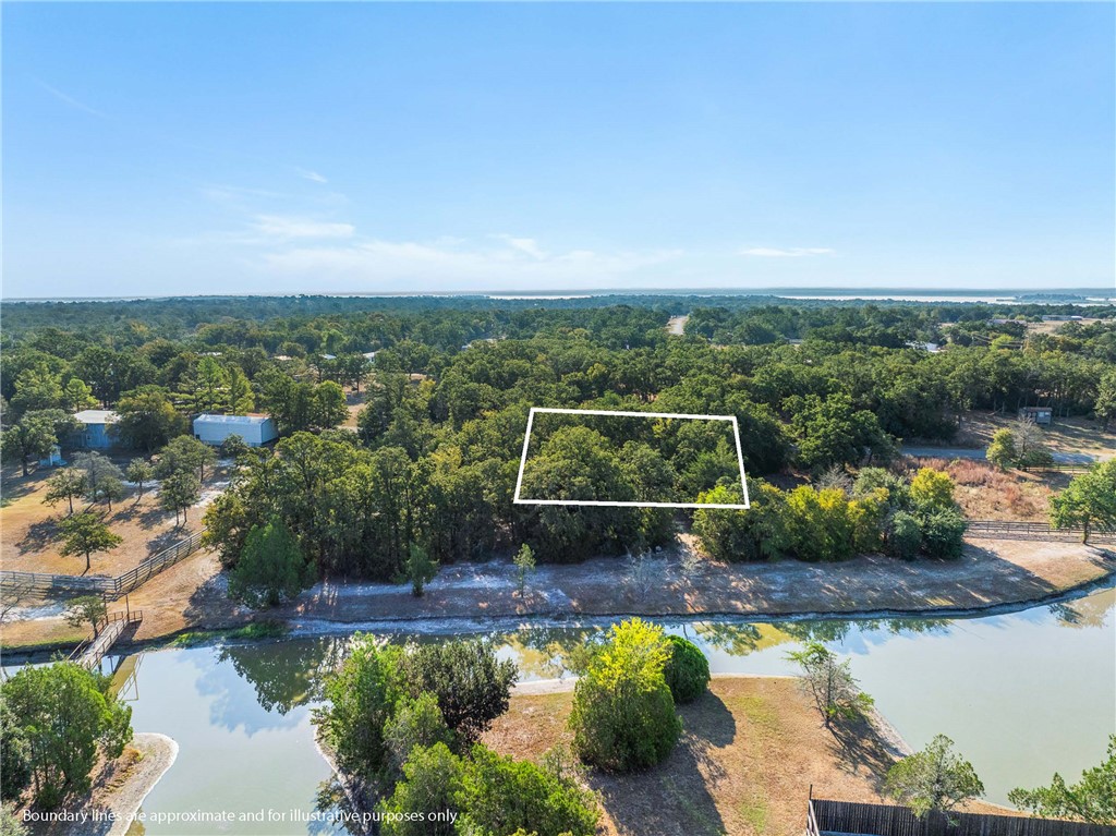 Tbd Wolf Run Street Somerville, TX 77879 - Photo 5 of 17 a view of a lake with a city