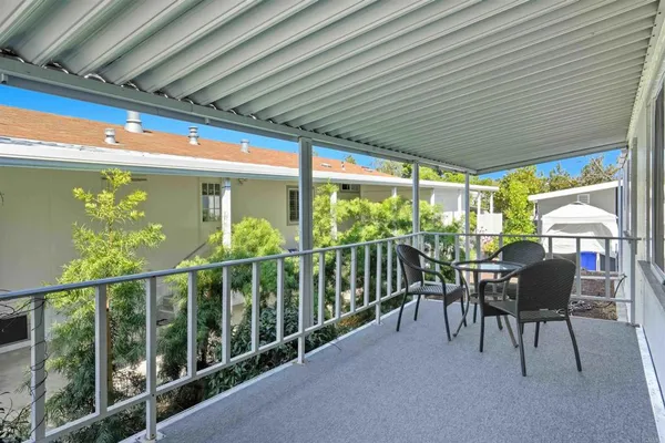 a view of porch with furniture