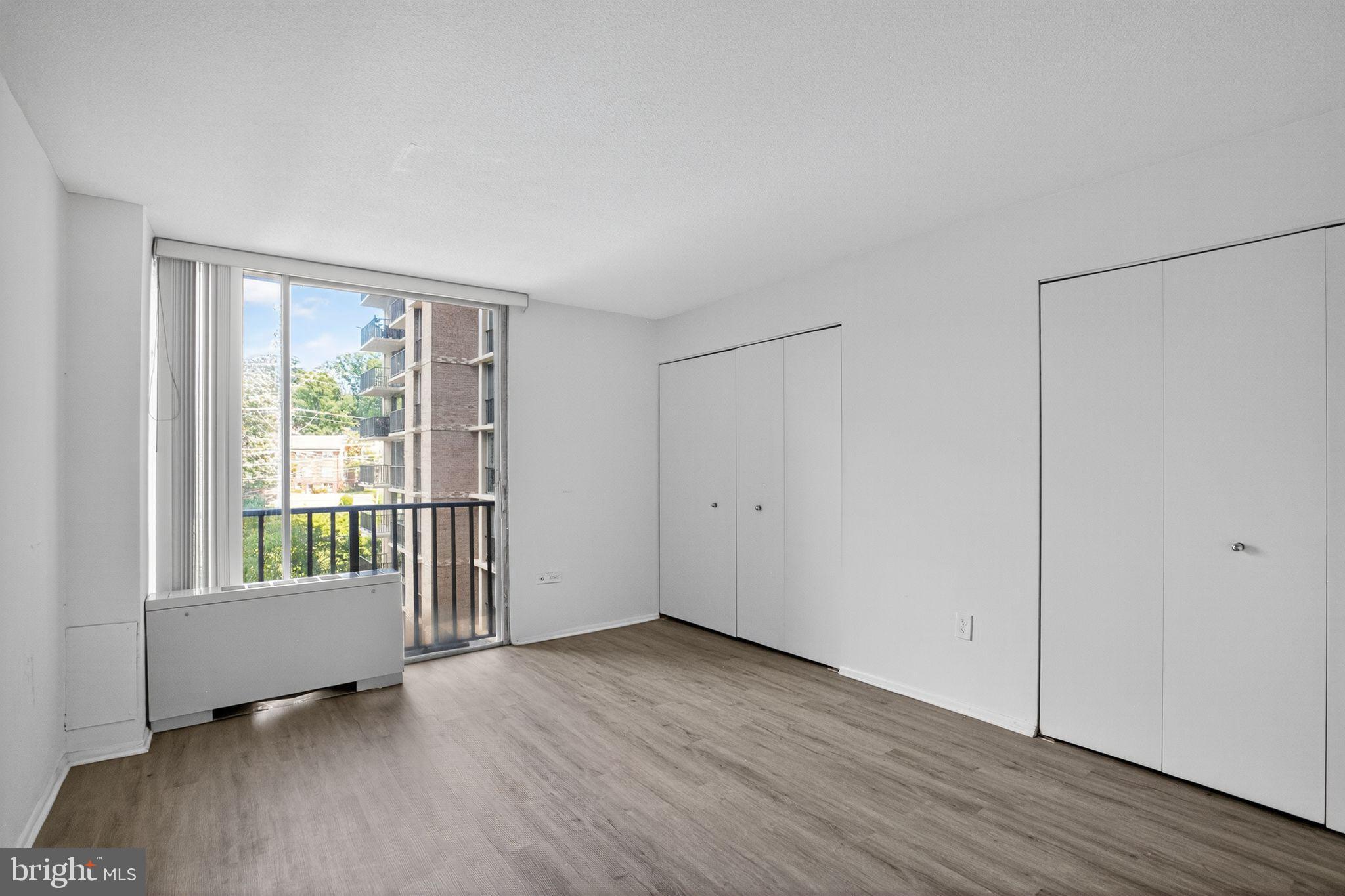 4600 South Four Mile Run Drive, Unit 421 Arlington, VA 22204 - Photo 16 of 17 Bright, airy space with serene views.