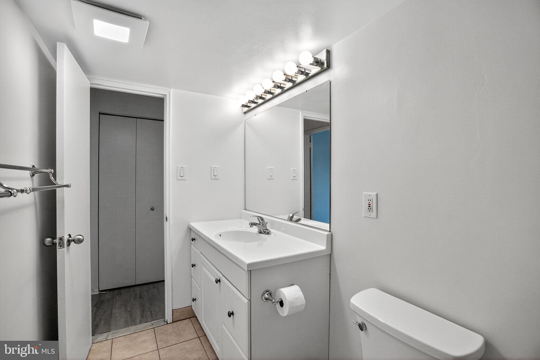 4600 South Four Mile Run Drive, Unit 421 Arlington, VA 22204 - Photo 10 of 17 Modern bathroom with sleek finishes.