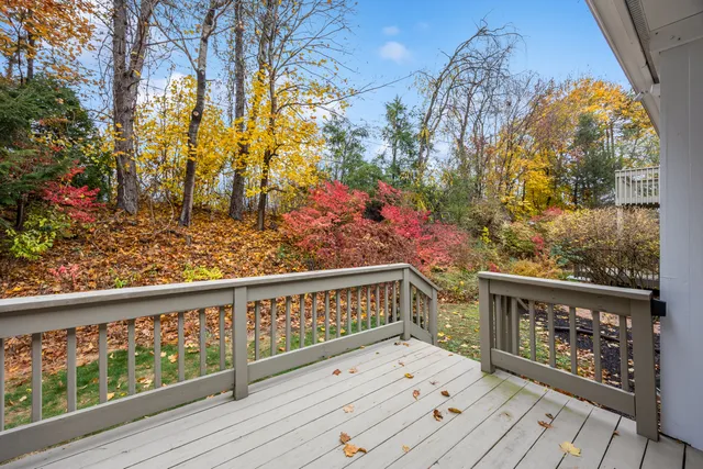 a view of balcony with wooden floor