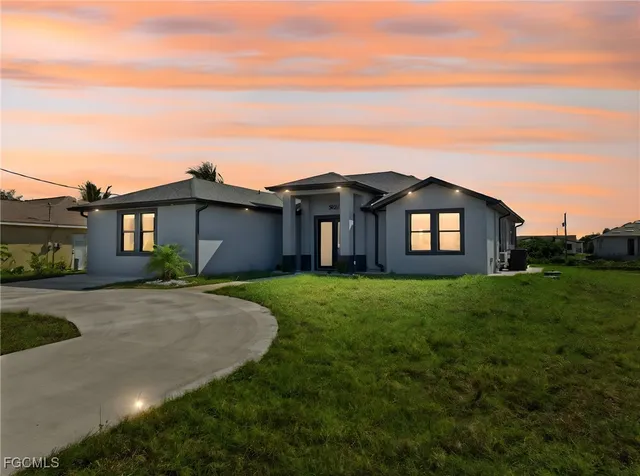 front view of a house with a yard