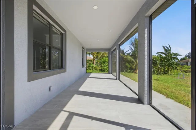 an aerial view of a house with a garden