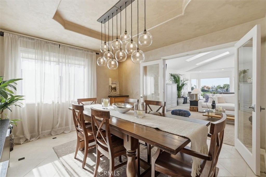 8325 Delgany Avenue Playa del Rey, CA 90293 - Photo 19 of 50 a view of a dining room with furniture and window
