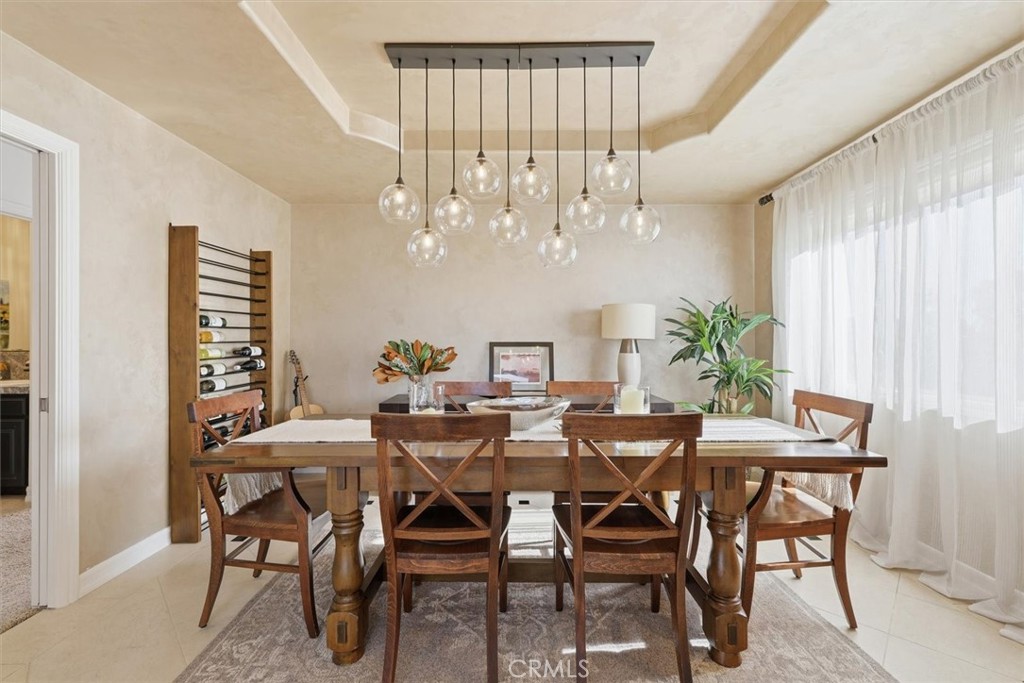 8325 Delgany Avenue Playa del Rey, CA 90293 - Photo 20 of 50 a view of a dining room with furniture and chandelier