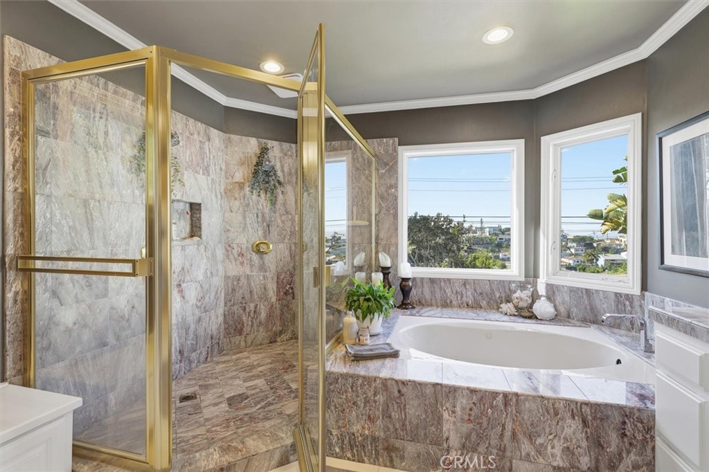 8325 Delgany Avenue Playa del Rey, CA 90293 - Photo 26 of 50 a bathroom with a granite countertop tub shower and sink