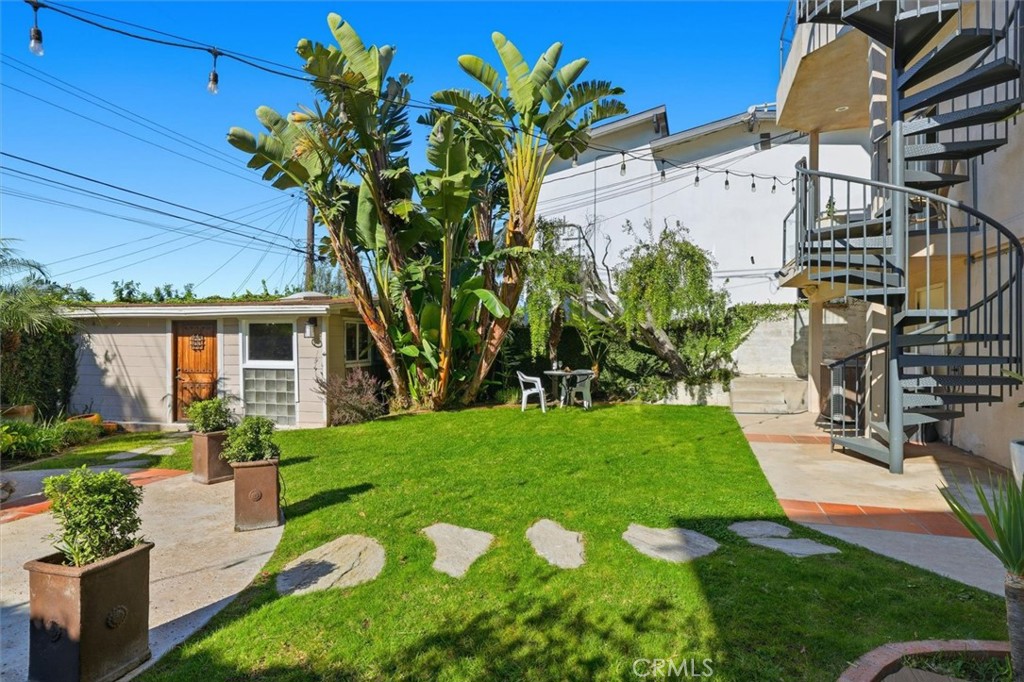 8325 Delgany Avenue Playa del Rey, CA 90293 - Photo 35 of 50 a front view of a house with garden