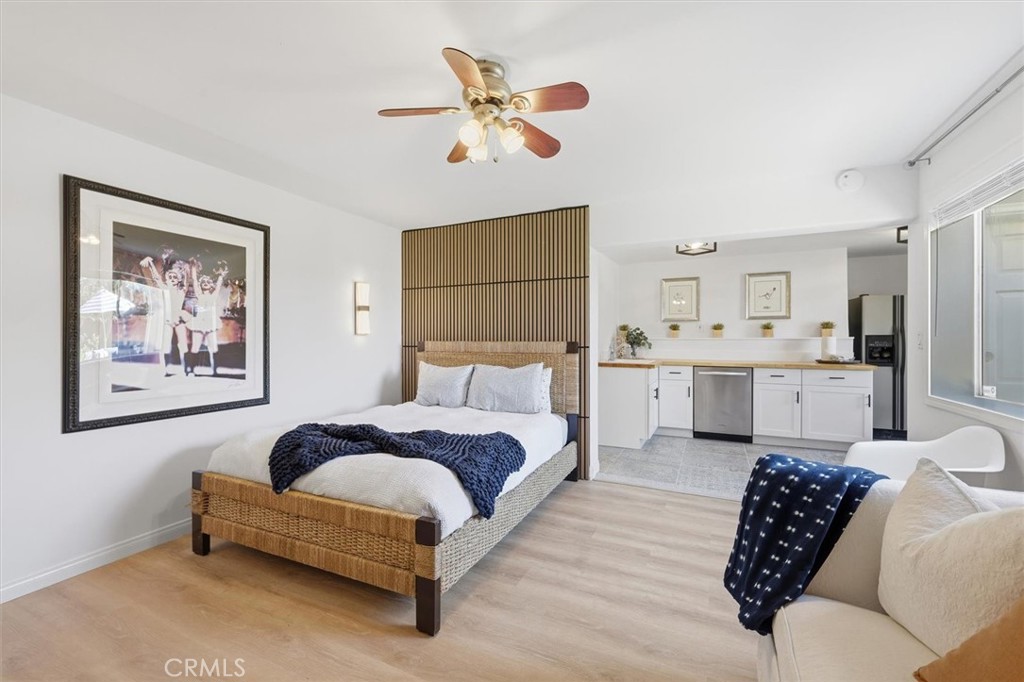 8325 Delgany Avenue Playa del Rey, CA 90293 - Photo 38 of 50 a spacious bedroom with a bed couch and window