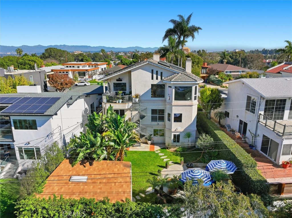 8325 Delgany Avenue Playa del Rey, CA 90293 - Photo 44 of 50 an aerial view of a house with a yard and potted plants