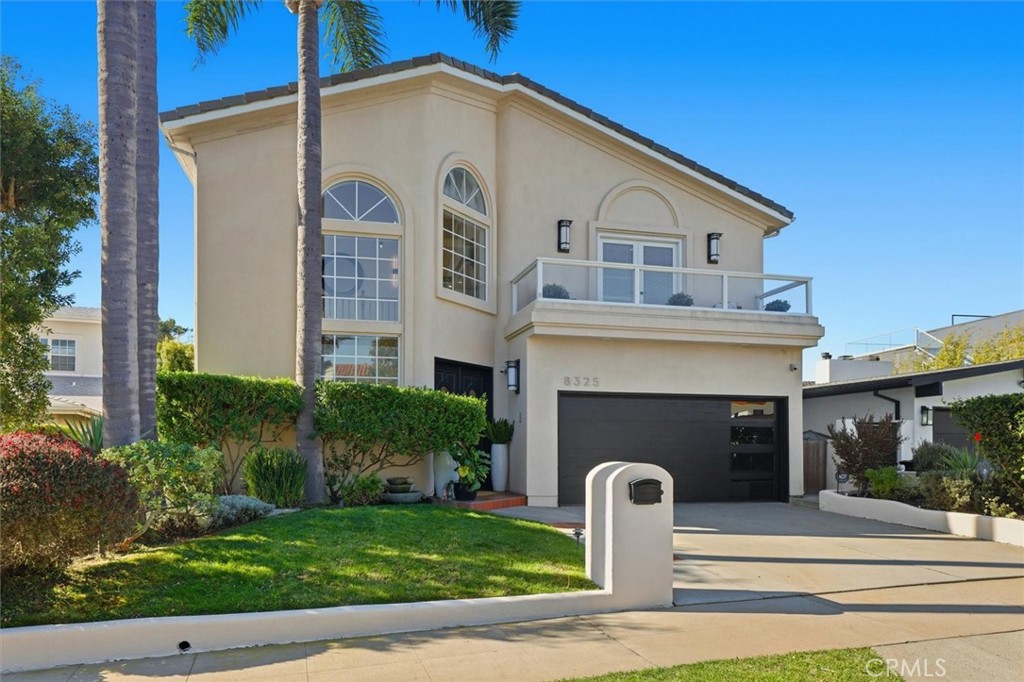 8325 Delgany Avenue Playa del Rey, CA 90293 - Photo 7 of 50 a front view of a house with garden