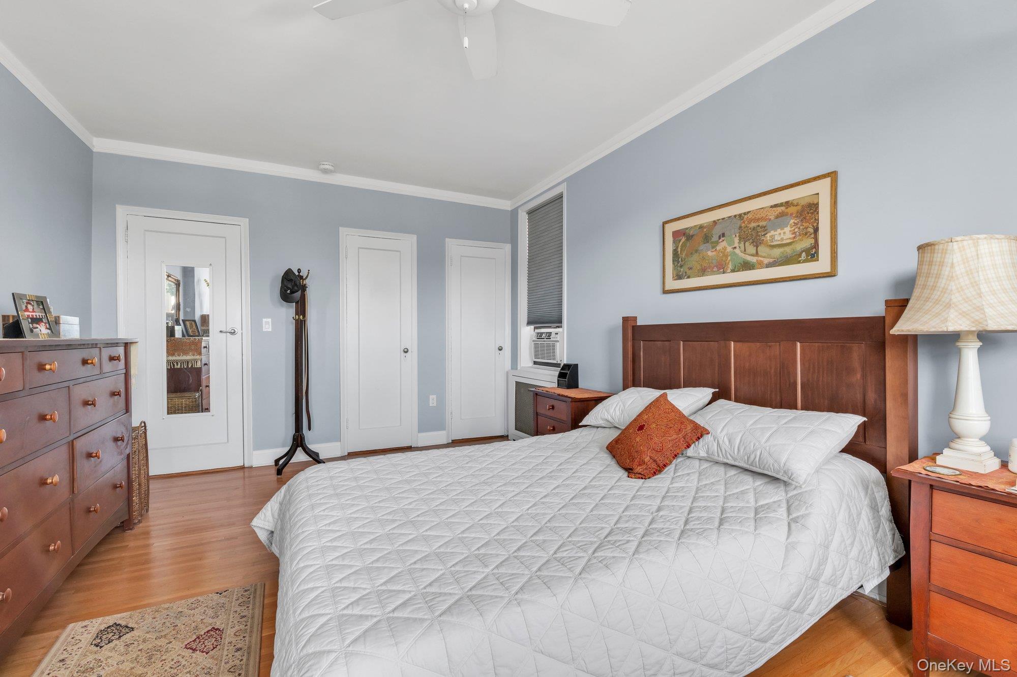 84-51 Beverly Road, Unit 6A Queens, NY 11415 - Photo 10 of 14 a bedroom with a bed and closet