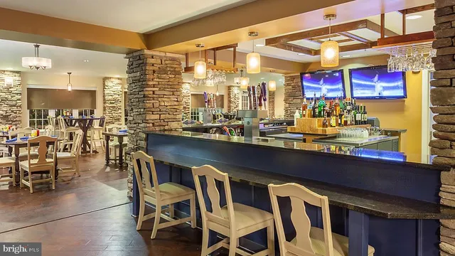 a view of the house with a yard