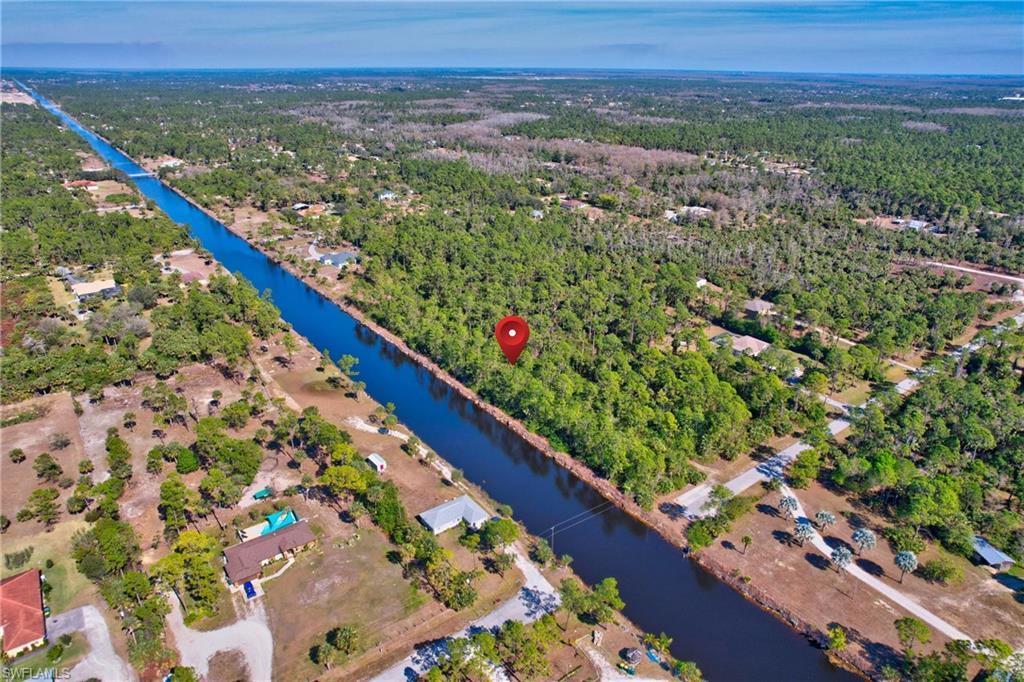 14 Ave Ne Naples Naples, FL 34102 - Photo 11 of 14 a view of mountain with a lake