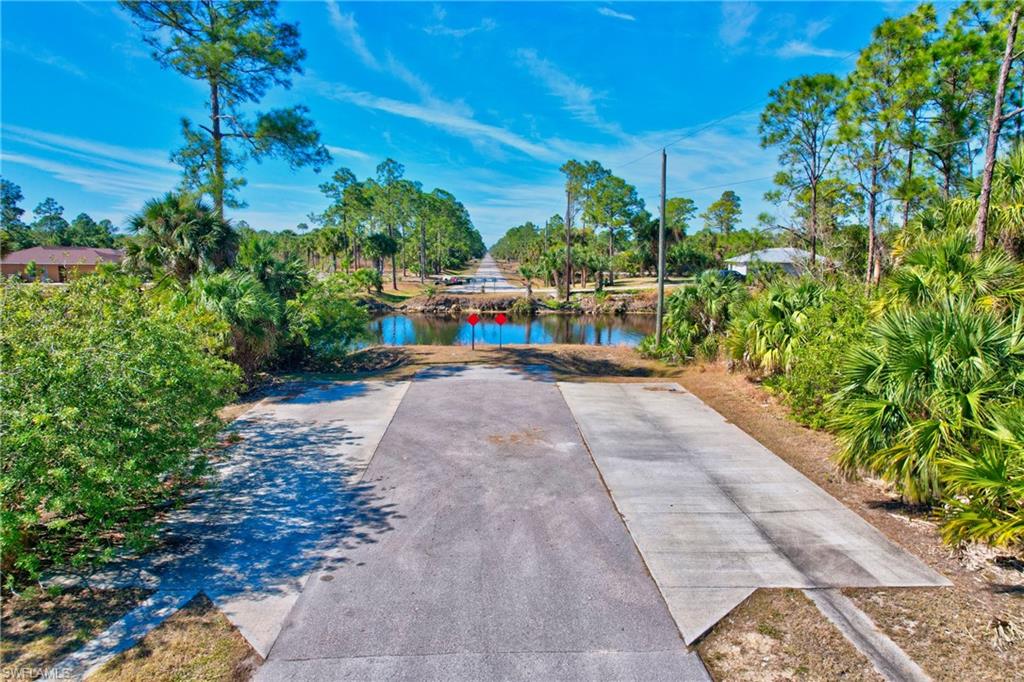 14 Ave Ne Naples Naples, FL 34102 - Photo 12 of 14 a view of a garden with an outdoor seating