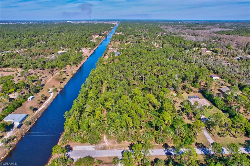 14 Ave Ne Naples Naples, FL 34102 - Photo 13 of 14 a view of an outdoor space and a yard