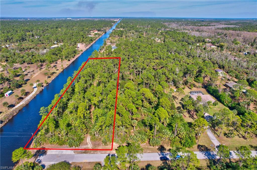 14 Ave Ne Naples Naples, FL 34102 - Photo 2 of 14 a view of an outdoor space with a lake view