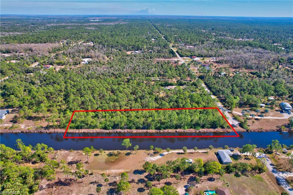 14 Ave Ne Naples Naples, FL 34102 - Photo 10 of 14 a view of a lot of flowers and trees