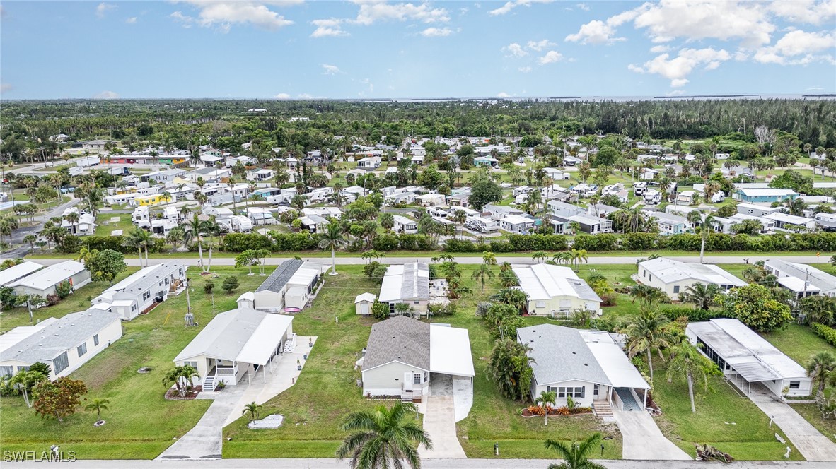 7679 Farrell Road Bokeelia, FL 33922 - Photo 34 of 34 an aerial view of residential houses with outdoor space
