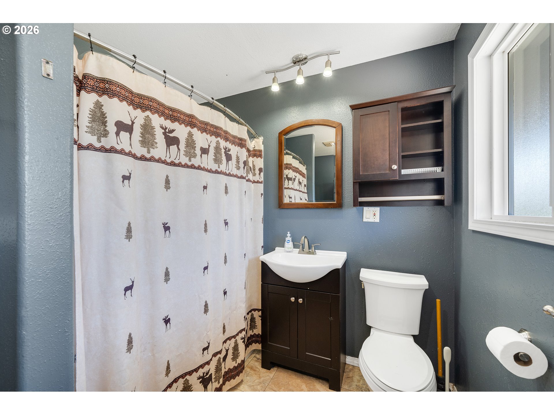 850 Hodgdon Road Tillamook, OR 97141 - Photo 27 of 43 a bathroom with a sink and a mirror