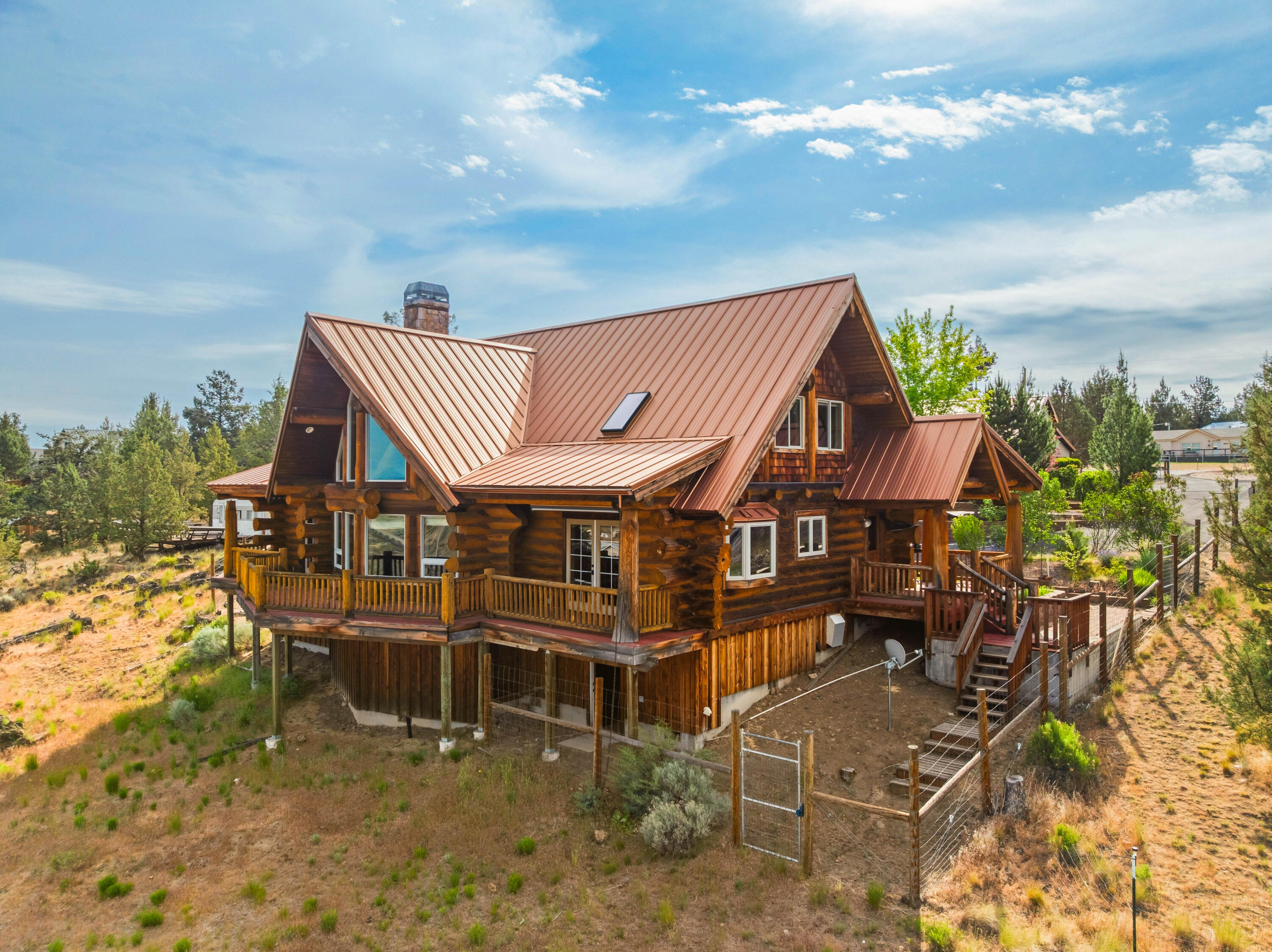 10739 Southwest Shad Road Terrebonne, OR 97760 - Photo 4 of 55 an aerial view of a house with swimming pool and sitting area
