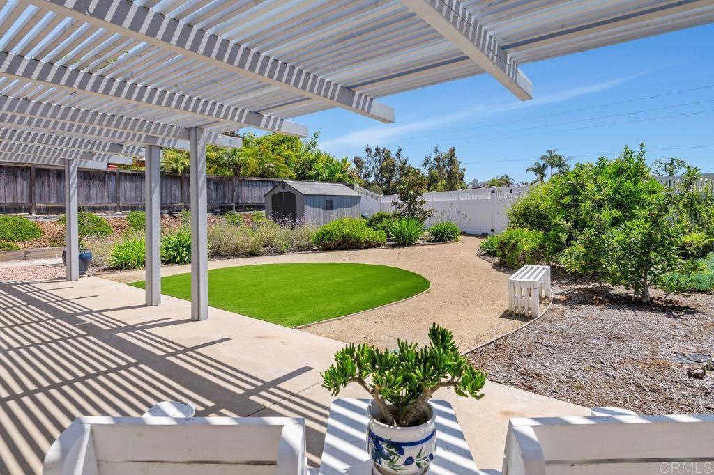 1064 Glen Arbor Drive Encinitas, CA 92024 - Photo 17 of 39 a view of a porch with a garden