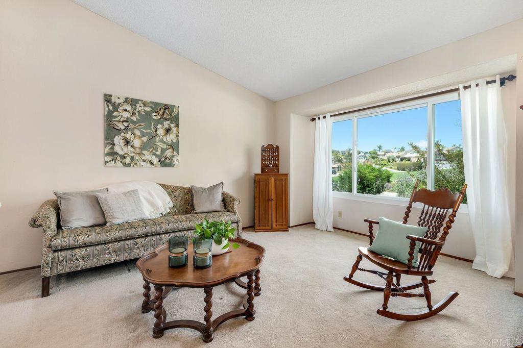 1064 Glen Arbor Drive Encinitas, CA 92024 - Photo 3 of 39 a living room with furniture and a window