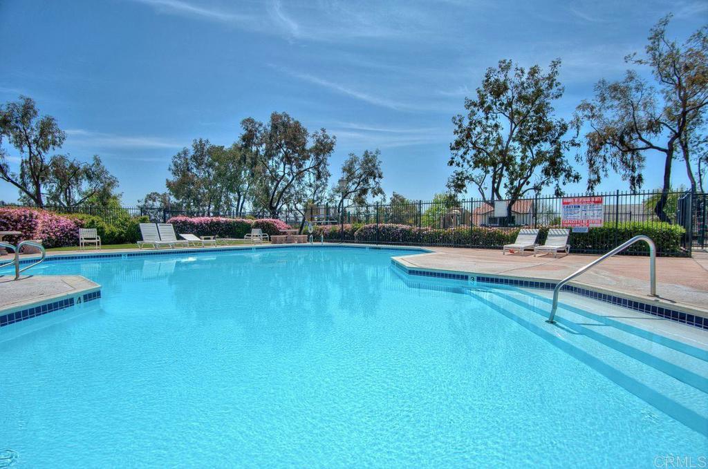 1064 Glen Arbor Drive Encinitas, CA 92024 - Photo 31 of 39 a swimming pool with outdoor seating and yard