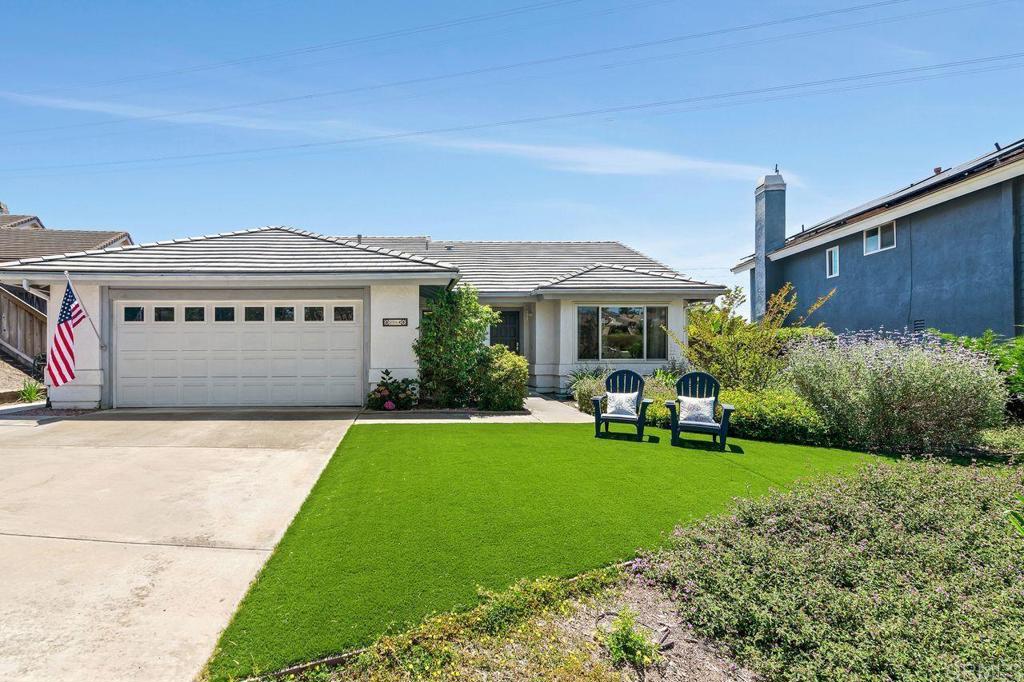 1064 Glen Arbor Drive Encinitas, CA 92024 - Photo 36 of 39 a front view of a house with garden