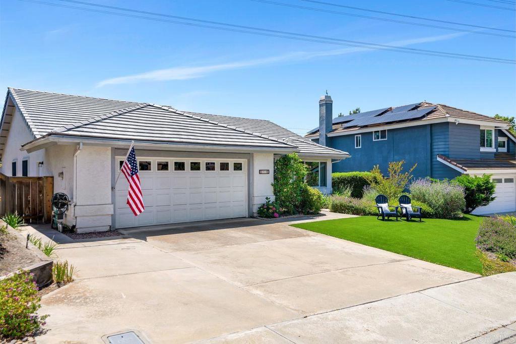 1064 Glen Arbor Drive Encinitas, CA 92024 - Photo 38 of 39 a front view of a house with garden