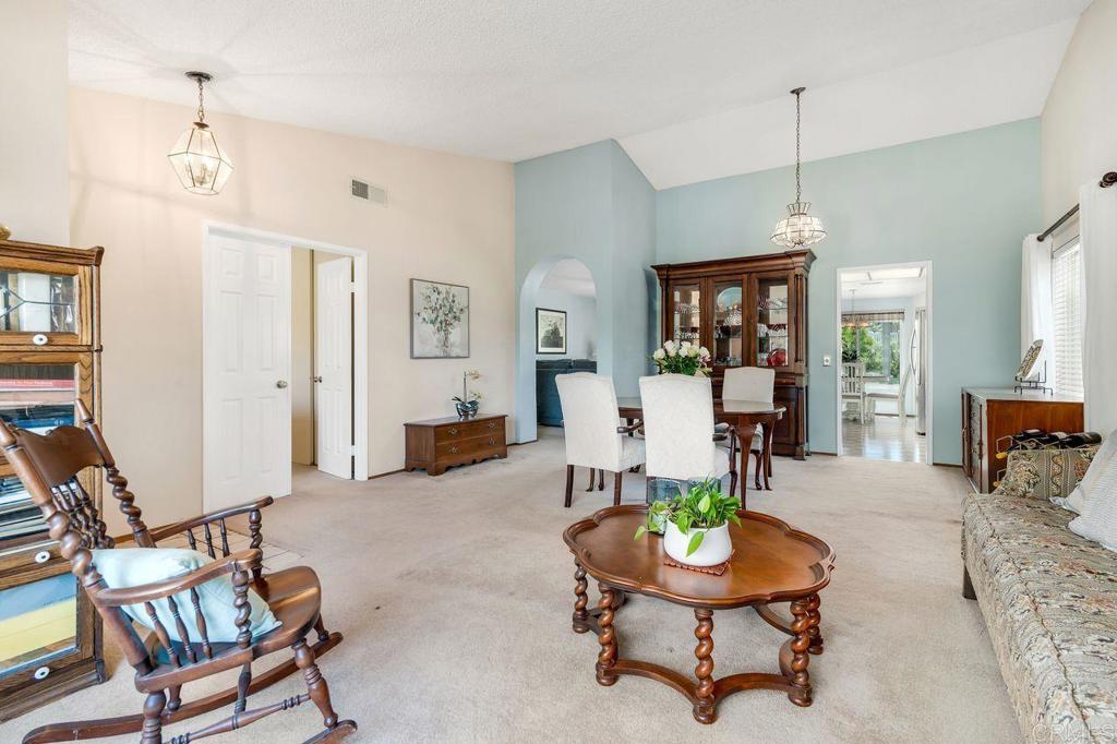 1064 Glen Arbor Drive Encinitas, CA 92024 - Photo 4 of 39 a living room with furniture and a table