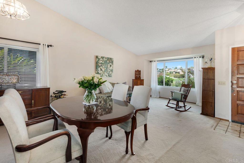 1064 Glen Arbor Drive Encinitas, CA 92024 - Photo 7 of 39 a view of a livingroom with furniture and a window