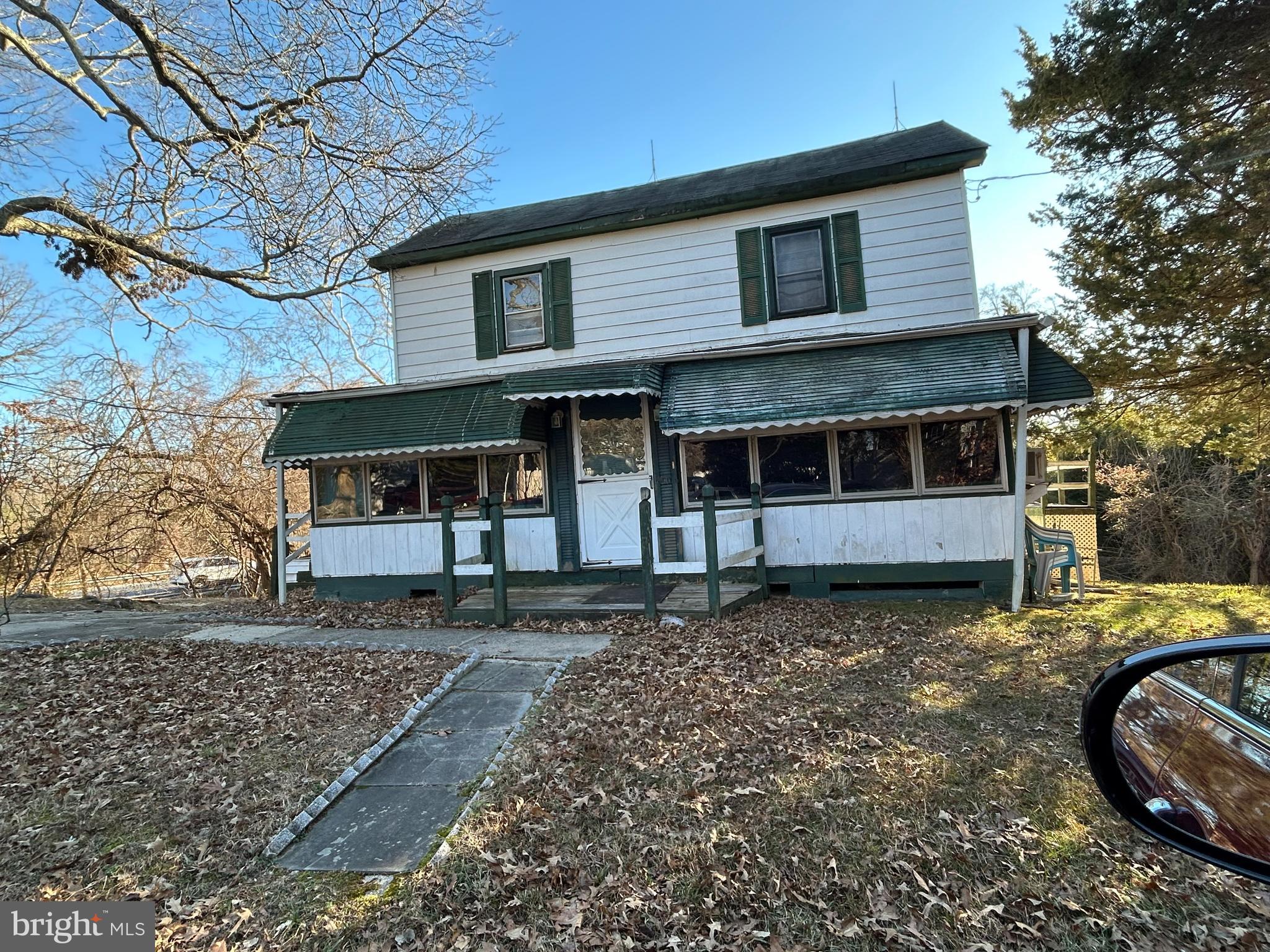 6905 Kent Road Owings, MD 20736 - Photo 1 of 1 a view of a house with a yard