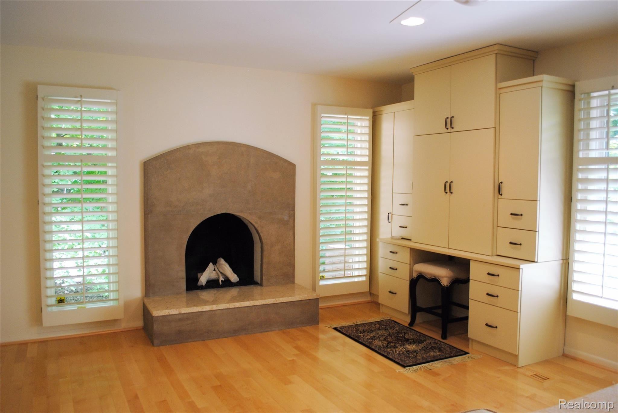 34100 Quaker Valley Road Farmington, MI 48331 - Photo 16 of 27 BEAUTIFUL LIMESTONE FIREPLACE IN MASTER BEDROOM