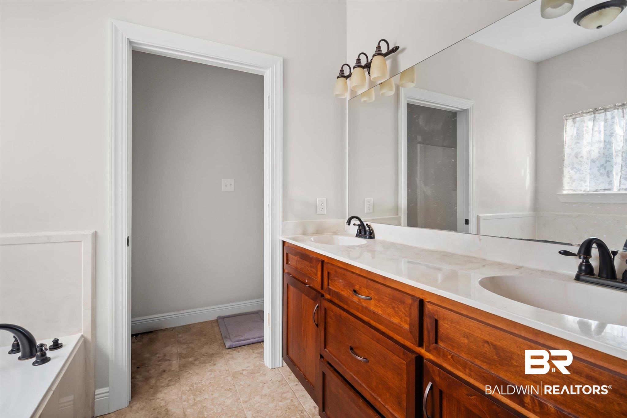 20792 Lonnie Walker Road Citronelle, AL 36522 - Photo 10 of 19 Bathroom featuring vanity and a tub