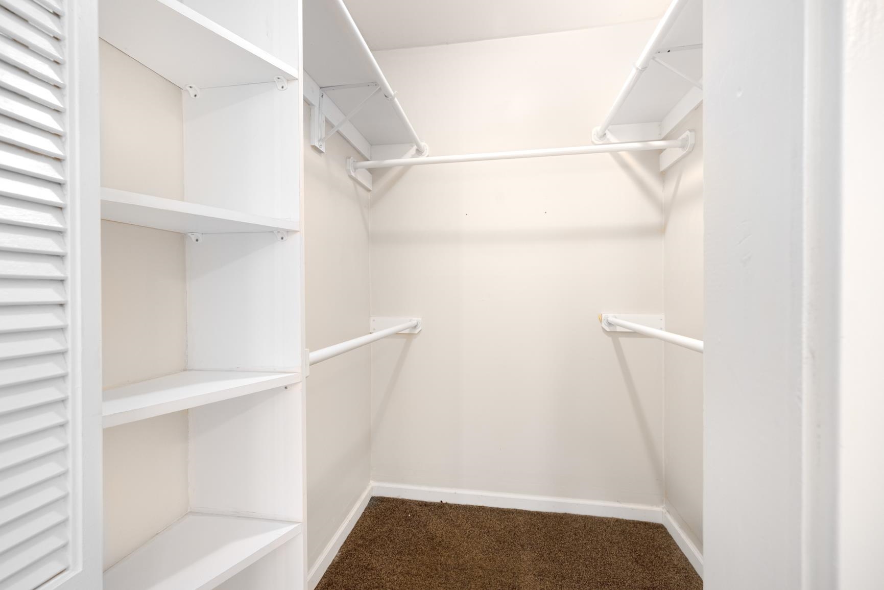 331 Alexander Street Memphis, TN 38111 - Photo 18 of 25 Walk in closet featuring dark colored carpet
