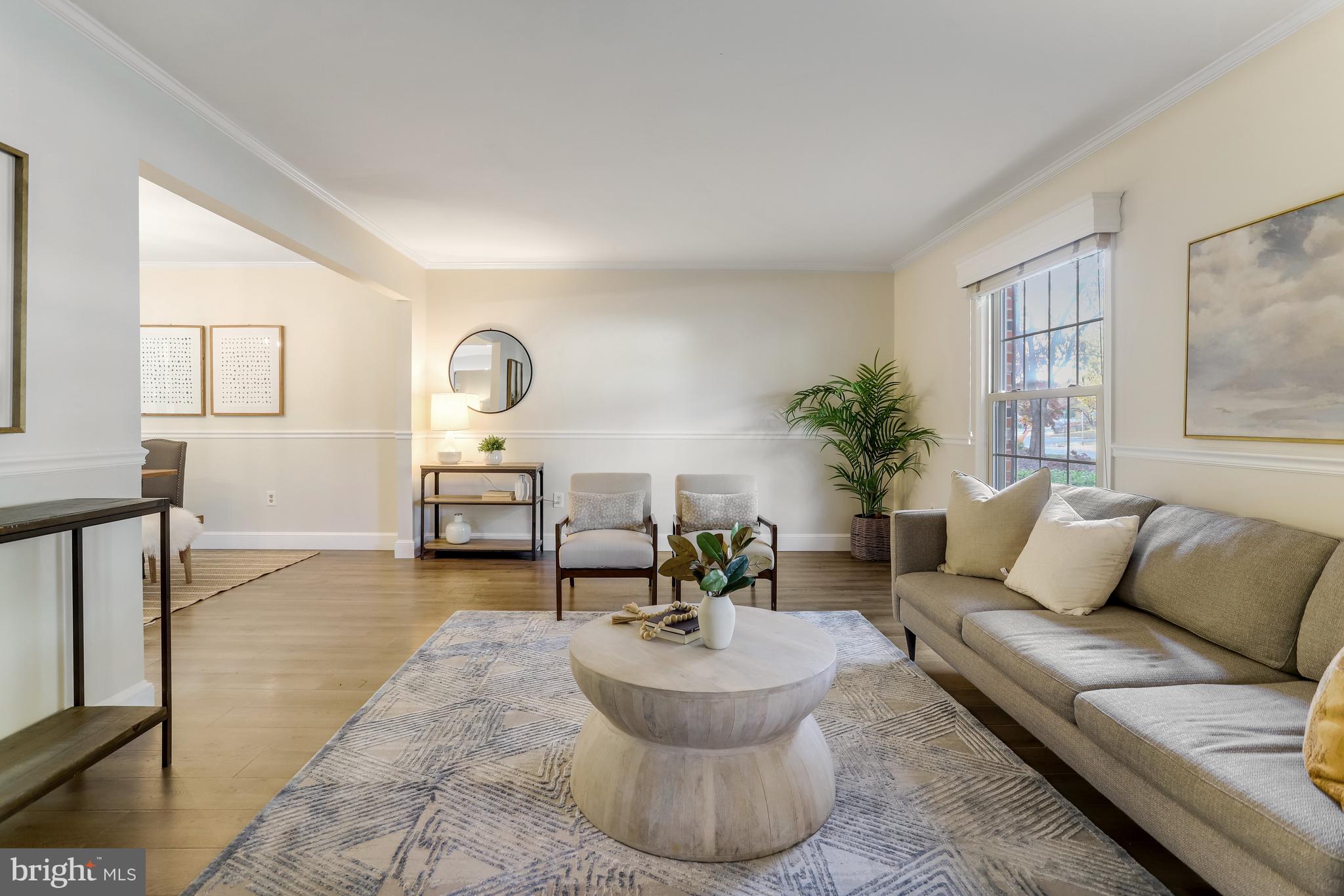 9210 Rockefeller Lane Springfield, VA 22153 - Photo 3 of 44 Fresh neutral paint and plenty of space in the LR