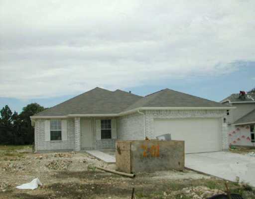 201 Bluebonnet Trail Leander, TX 78641 - Photo 1 of 1 front view of a house with table