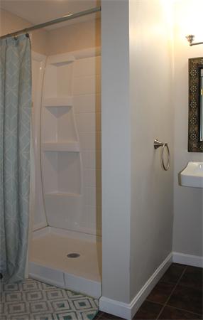 29 Cogger Road Lowell, MA 01854 - Photo 12 of 24 a bathroom with a shower