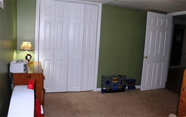 29 Cogger Road Lowell, MA 01854 - Photo 19 of 24 a room with toys and a window