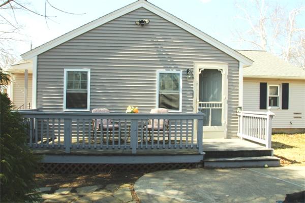 29 Cogger Road Lowell, MA 01854 - Photo 2 of 24 a front view of a house with swimming pool
